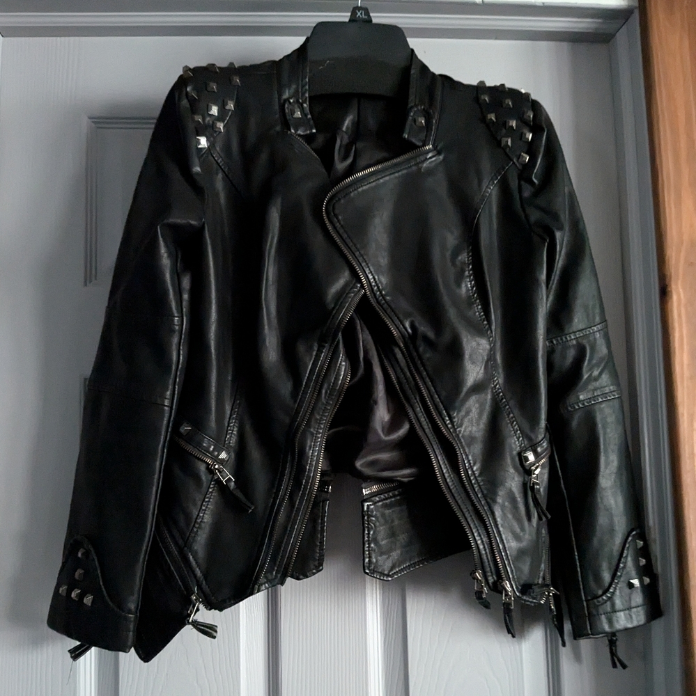 Moto style women's black studded jacket, runs small